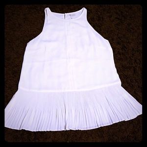 White peplum pleated hem sleeveless top